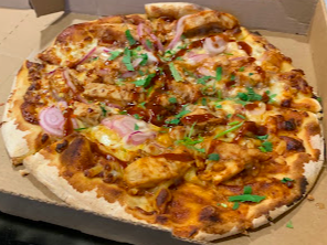 California Pizza Kitchen signature dishes Original BBQ Chicken Pizza
California Club Pizza
Thai Crunch Salad